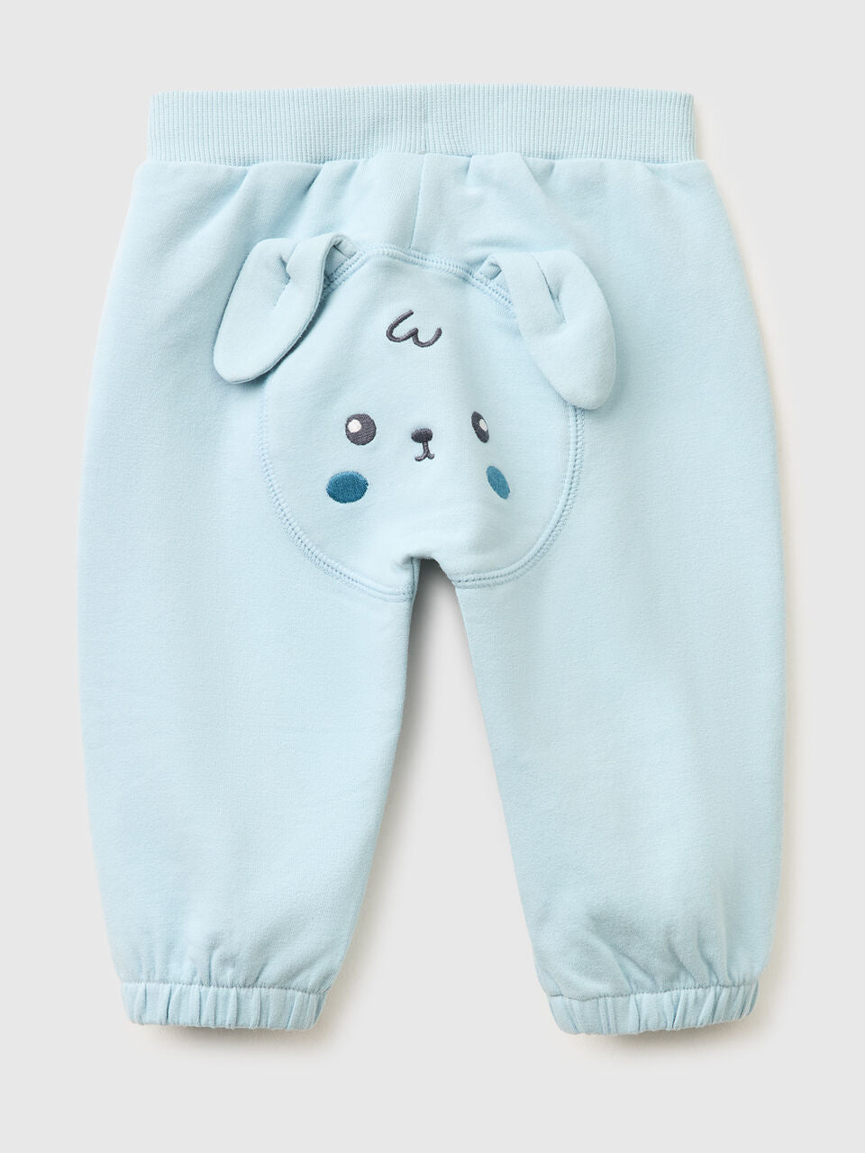 TROUSERS WITH EMBROIDERY ON THE BACK