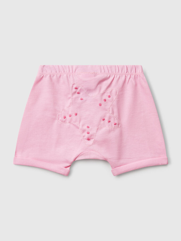 Shorts with patch on the back