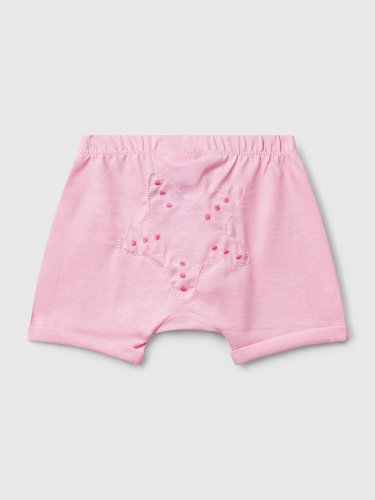 Shorts with patch on the back